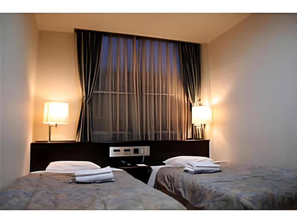 Kochi Business Hotel Bekkan Esterno foto
