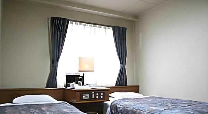 Kochi Business Hotel Bekkan Esterno foto